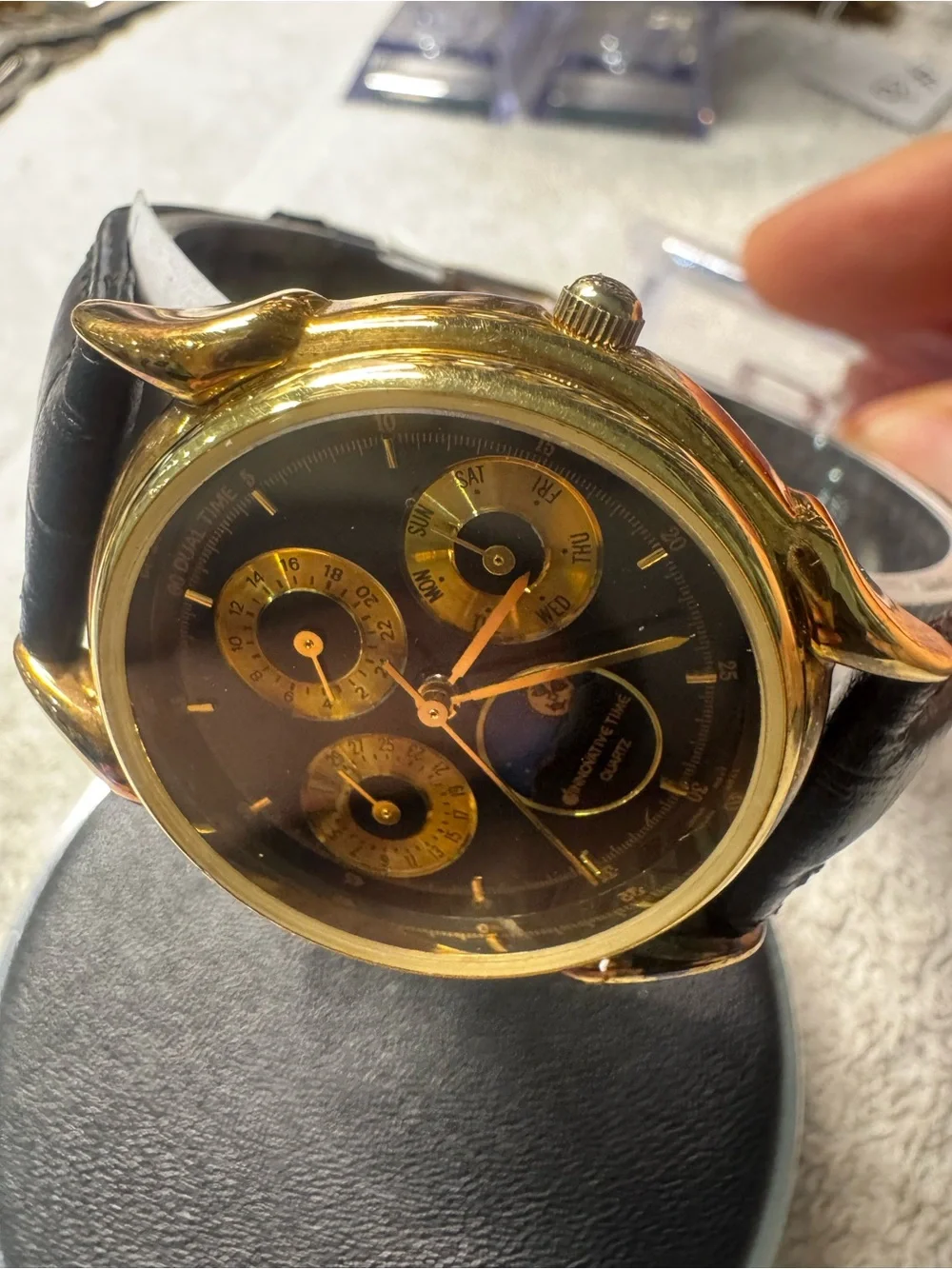 Quartz Men's Gold and Black Multi-Function Watch